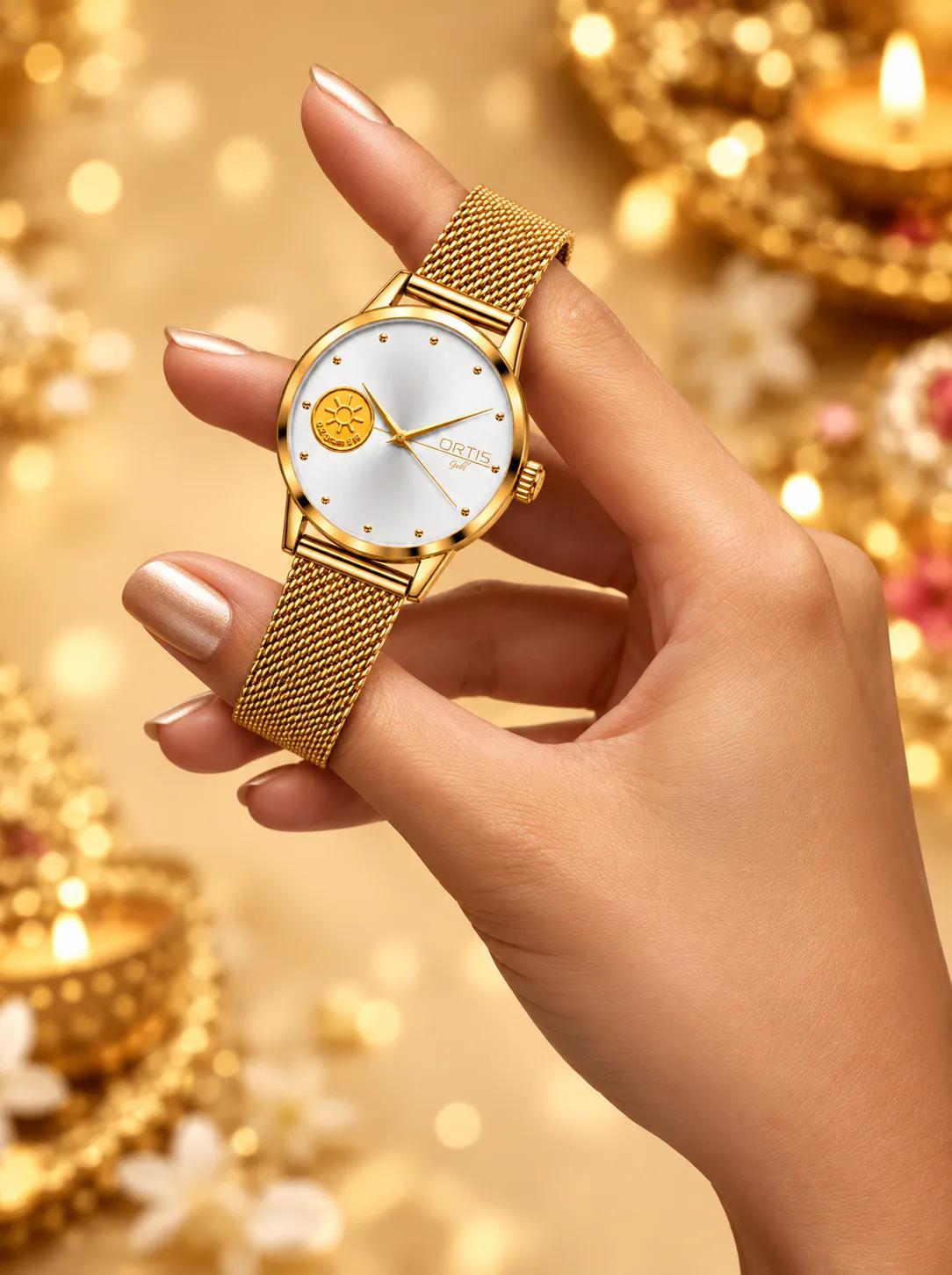 ORTIS women's white dial watch held in hand, festive glow