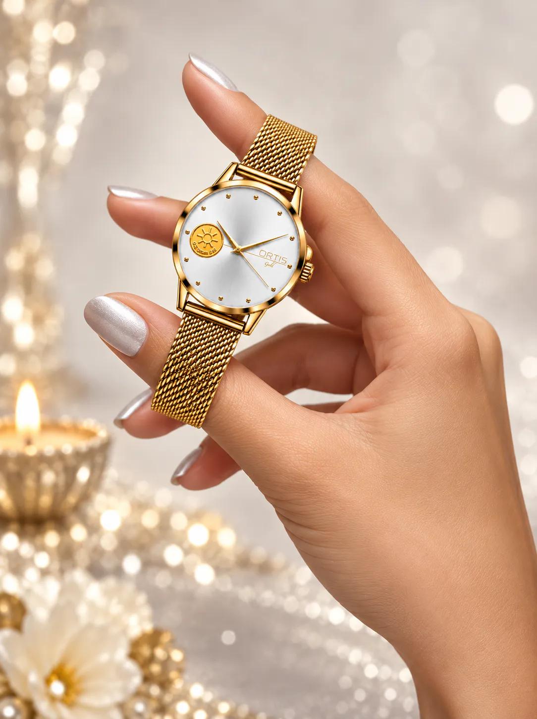 ORTIS women's white dial watch held in hand