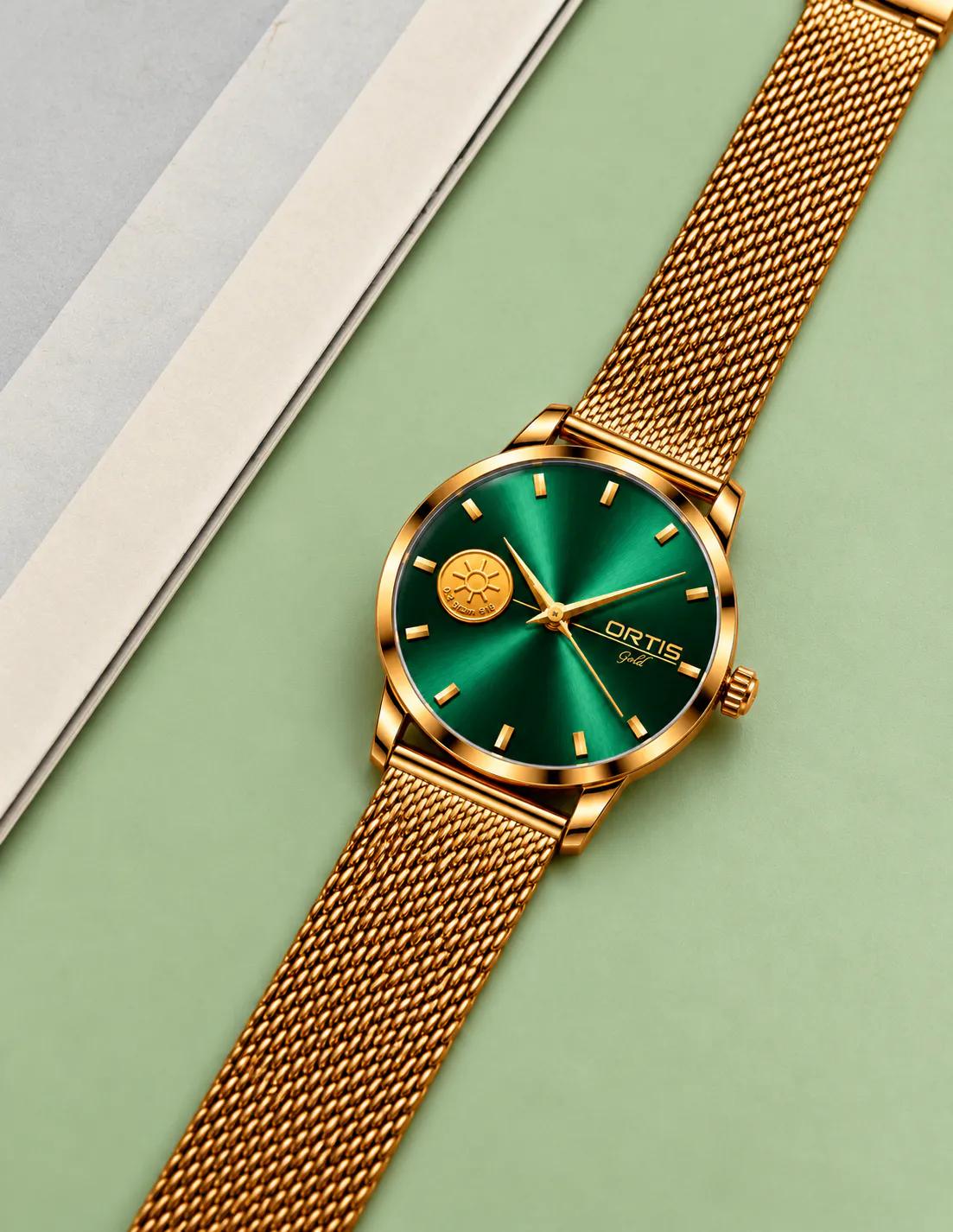 ORTIS men's green dial watch on mint background
